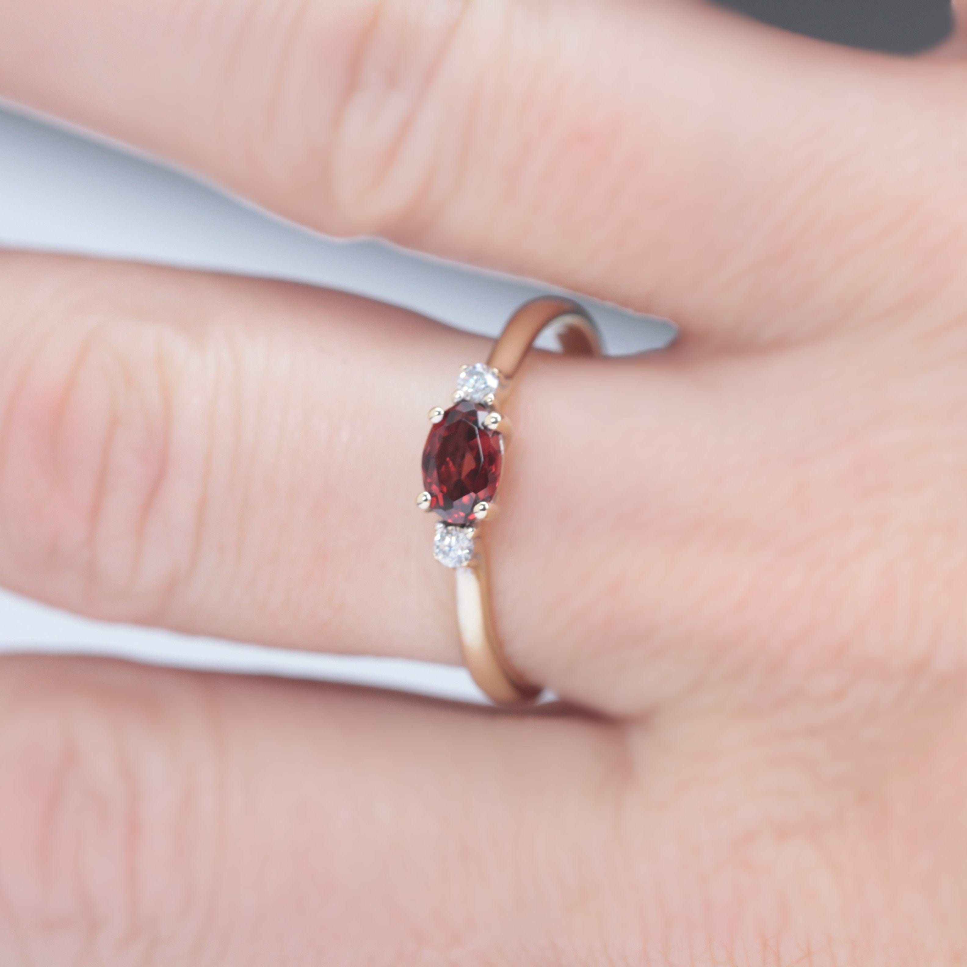 garnet and diamond engagement ring in yellow gold