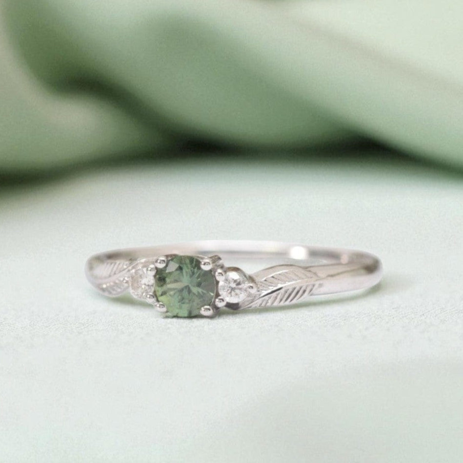 green sapphire leaf engagement ring white gold