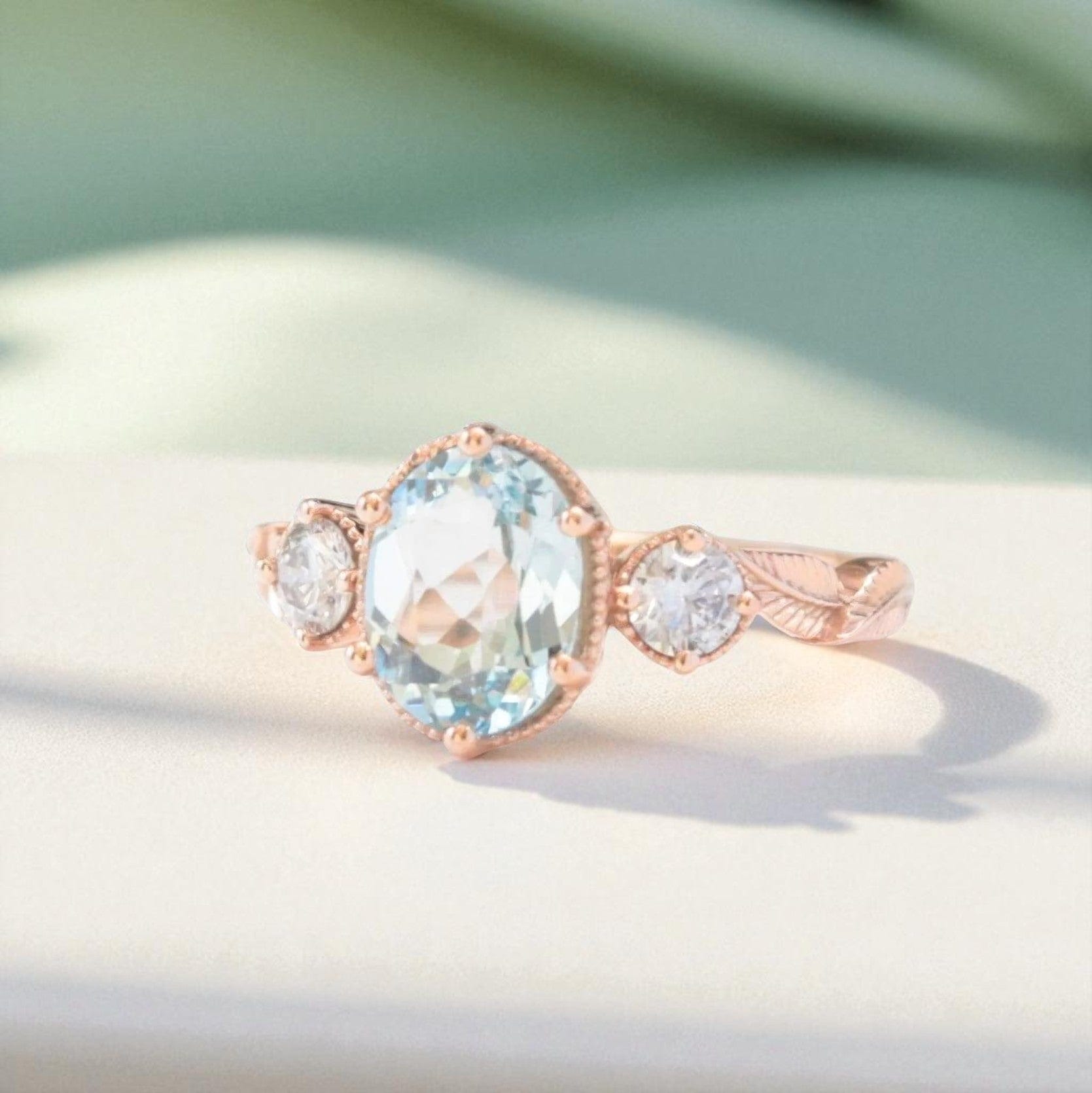 oval aquamarine diamond leaf ring