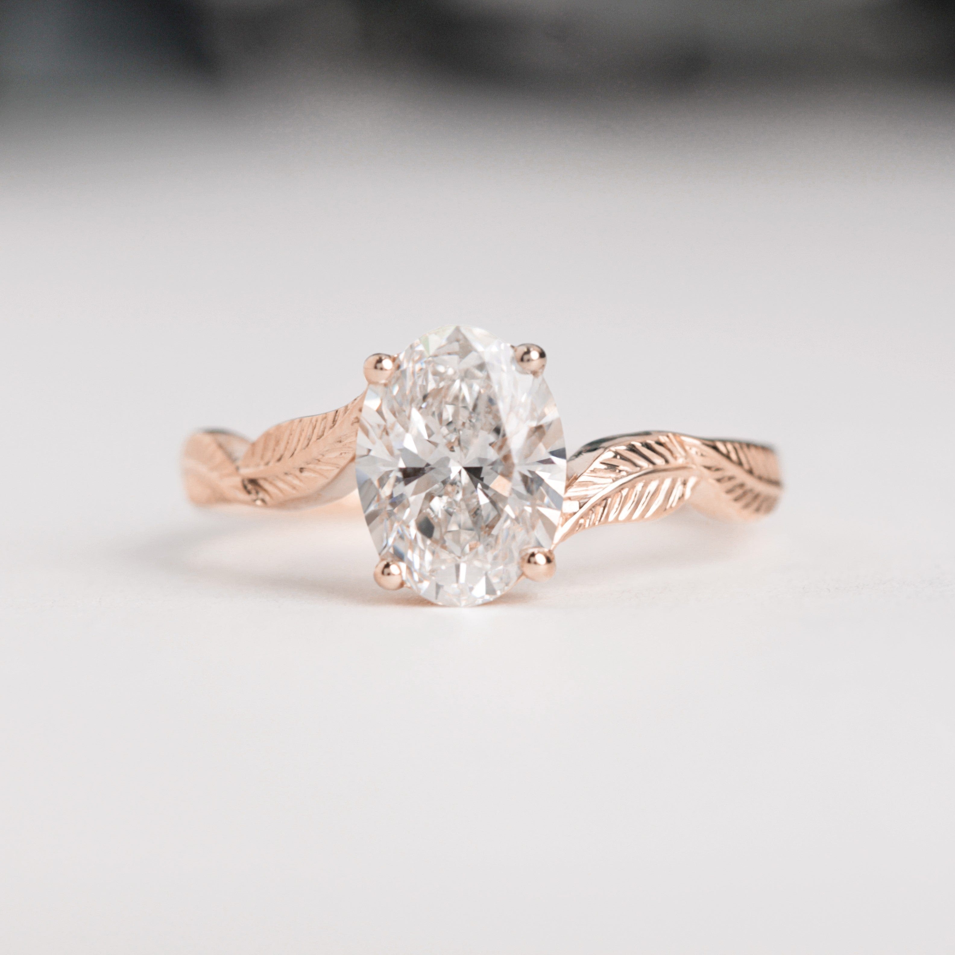 oval diamond leaf engagement ring rose gold