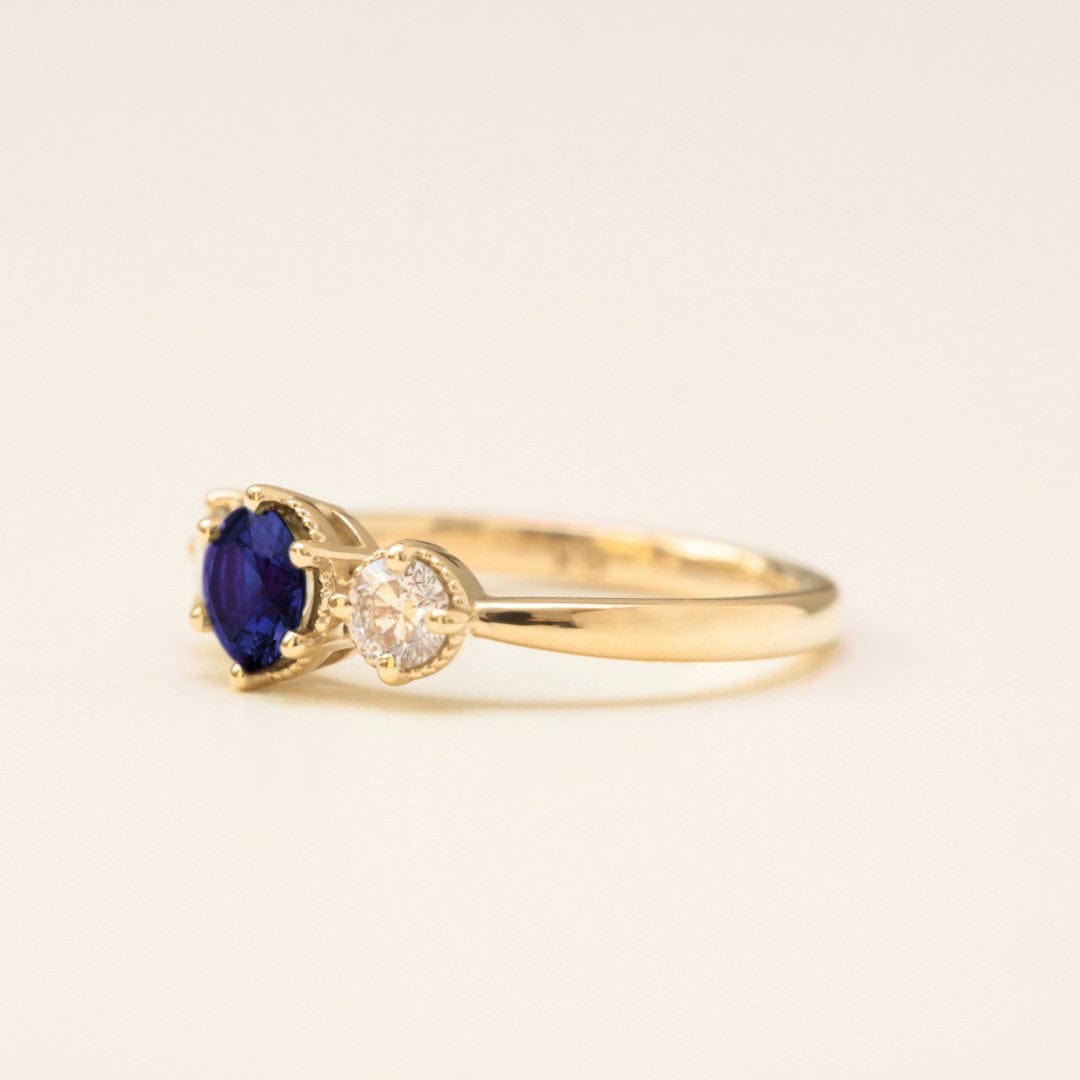 blue-sapphire-diamond-engagement-ring-yellow-gold