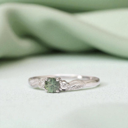 green sapphire leaf engagement ring white gold
