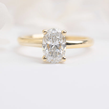 oval solitaire lab diamond engagement ring yellow gold