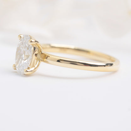 oval solitaire lab diamond engagement ring yellow gold